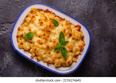 American mac and cheese, macaroni pasta in cheesy sauce. Top view.