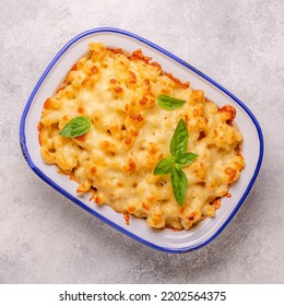 American mac and cheese, macaroni pasta in cheesy sauce. Top view. - Shutterstock ID 2202564375