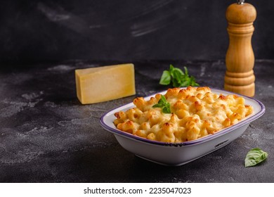 American mac and cheese, macaroni pasta in cheesy sauce. - Shutterstock ID 2235047023
