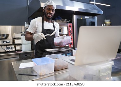 American Male Making Online Cooking Lesson Of Cooking