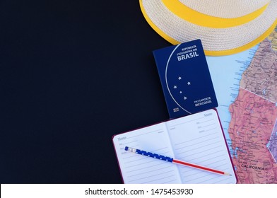 American Map, Hat, Passport, Notepad And Pencil With American Flag On Black Background With Empty Place For Text.