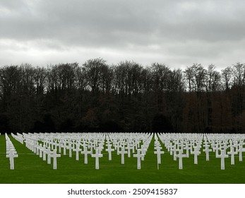 American Military Cemetery: White Crosses on a Green Meadow - Powered by Shutterstock