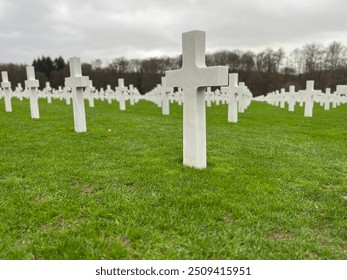 American Military Cemetery: White Crosses on a Green Meadow - Powered by Shutterstock