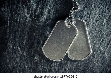 American military dog tags. Rough and worn with blank space for text. Memorial Day or Veterans Day concept. - Powered by Shutterstock