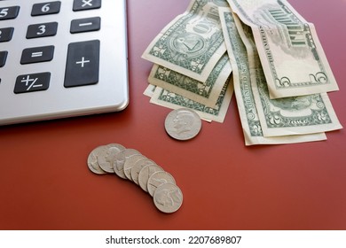 American Money - Coins And Bills - Beside Calculator  