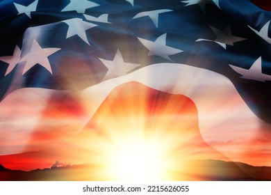 American National Holidays. Independence Day, Memorial Day. Flag Of USA Waving At Background With Sunset And Silhouette Of Mountain, Double Exposure. Concept Of Liberty, Patriotism And Pride.