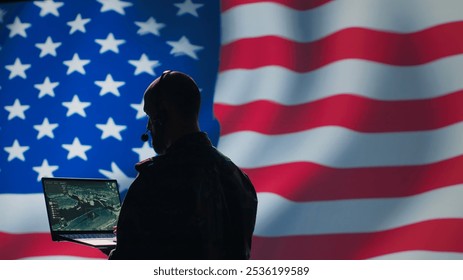 American NATO air defense operator uses radar detecting missile attacks, conducting space surveillance and satellite tracking. United States agent uses military software preventing rockets, camera A - Powered by Shutterstock