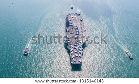 American navy aircraft carrier, USA navy ship carrier full loading airplane fighter jet aircraft, Aerial view army navy nuclear ship carrier full fighter jet aircraft concept technology of battleship.