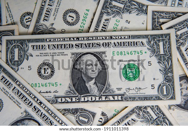 American one\
dollar banknotes wallpaper. Close up of money. Wealth concept, free\
trade, business concept\
background.