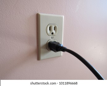 American Outlet With Cord Plugged In 