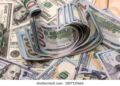 American paper dollar bills as background - Shutterstock ID 1007135665