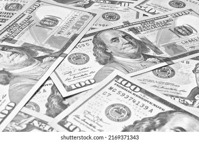 American Paper Money. 100 Dollar And Other US Bills. Black And White Light Background Or Wallpaper. Savings Economy And The USA Dollar. National Debt And Treasury