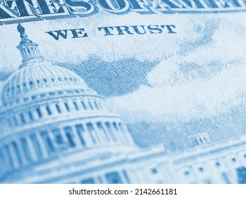 American Paper Money Background. Fragment Of Reverse Of $50 Bill Showing The Capitol. US Banknote Closeup. Blue Tinted Wallpaper. Public National Debt And Dollar. Bonds And Treasuries. We Trust. Macro