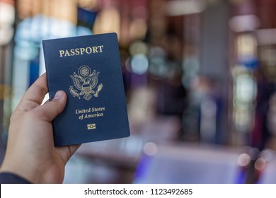 American Passport In Hand