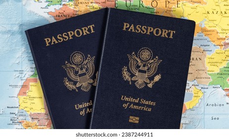 American Passports over World Map Atlas stock photo concept of on arrival visa,travel and immigration 
