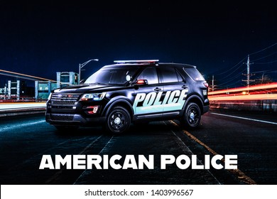 American Police Car Stands On A Highway