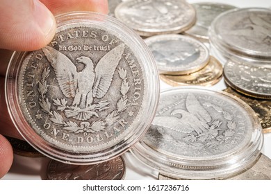 American Quarter Dollar And Collectible Coins On A Table. Macro Photo.