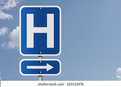 An American road sign with a sky background and a capital H, Hospital Direction Sign