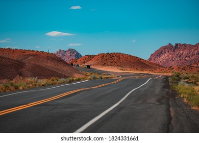 American Roadtrip. Natural American Landscape With Asphalt Road To Horizon