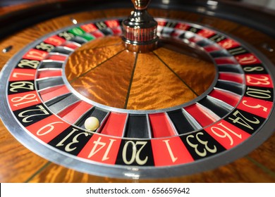 American Roulette wheel with a ball in the number '31'