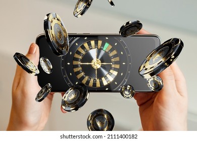 American roulette wheel on smartphone screen, online casino. The concept of gaming applications, internet games, online entertainment. Copy space - Shutterstock ID 2111400182