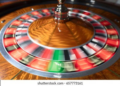 American Roulette wheel with spinning numbers.