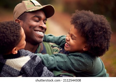 American Soldier In Uniform Returning Home On Leave To Family Greeted By Two Children - Powered by Shutterstock