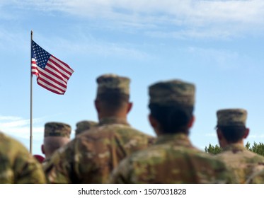 American Soldiers And Flag Of USA. US Army. US Troops