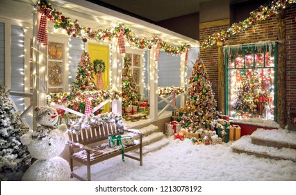 American style Christmas studio house with fake snow, a bench, a snowman Christmas trees and a lot of details - Powered by Shutterstock