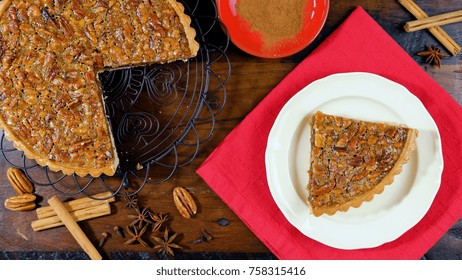 American Style Pecan Pie On Rustic Dark Wood Table Overhead For Thanskgiving Or Christmas Celebrations 