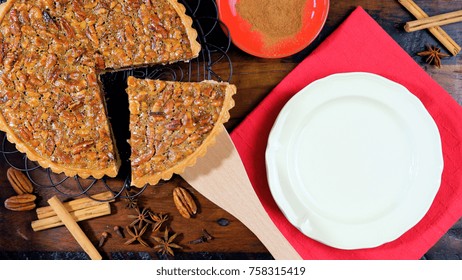 American Style Pecan Pie On Rustic Dark Wood Table Overhead For Thanskgiving Or Christmas Celebrations 