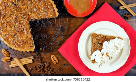 American Style Pecan Pie On Rustic Dark Wood Table Overhead For Thanskgiving Or Christmas Celebrations 