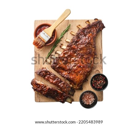 American style pork ribs glazed with  bbq souce with salt and pepper, isolated on white. Top view.
