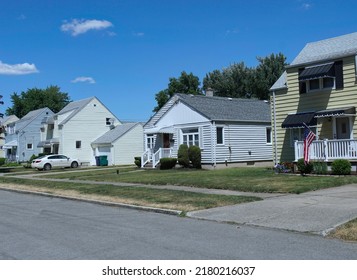 American Suburban Residential Street With Modest Clapboard Houses