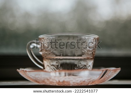 American Sweetheart Pink Depression Glass Teacup and Saucer on Windowsil - Morning Tea