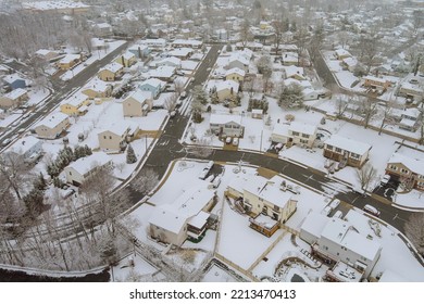 American Town With Small Number Of House Complexes With Snow Covering The Roofs During A Snowstorm The Winter Season In New Jersey