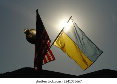 American and Ukrainian flags hang from a lamppost on Pennsylvania Avenue in Washington, DC, during a visit from Ukrainian President Volodymyr Zelenskyy.