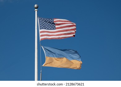 American and Ukrainian flags national ukraine two outside