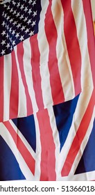 American US Flag And British Great Britain Union Jack Flag Hanging Down Together