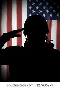 American (USA) soldier saluting to USA flag