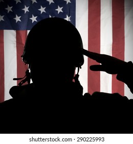 American (USA) Soldier Saluting To USA Flag