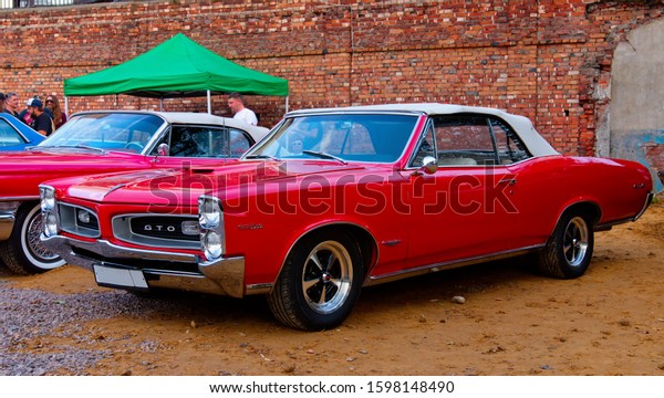 American vintage\
muscle car 1966 Pontiac GTO on Original Meet Show. Russia, St.\
Petersburg, September 7,\
2019.