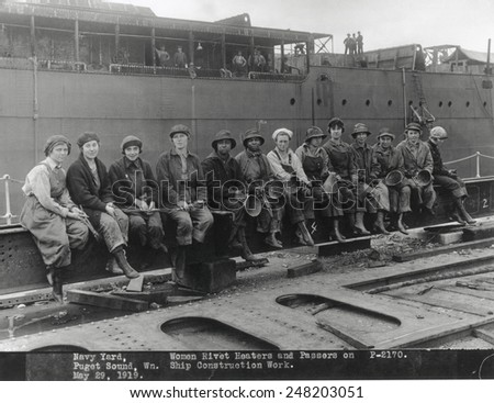 American women shipbuilders during World War 1. May 29, 1919. They work as rivet heaters and passers on at the Puget Sound Navy Yard, Washington.