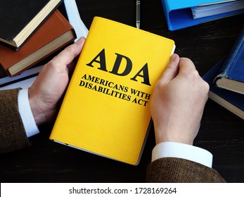 Americans With Disabilities Act ADA Law On The Wooden Surface.
