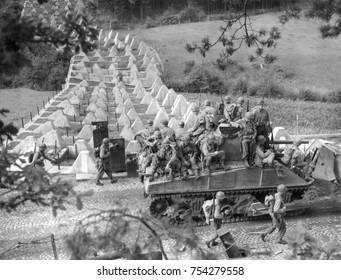 Americans Roll Through Siegfried Line On A 'tank Dozer' Near Roetgen, Germany, On Sept. 28, 1944. Roetgen Was The First German Municipality He Captured By US Troops During World War 2