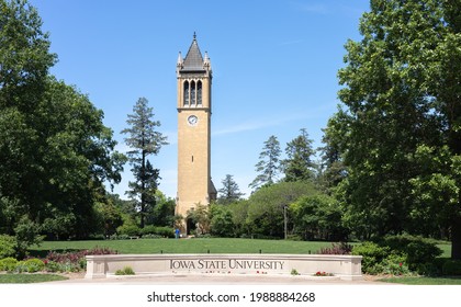Ames, Iowa, USA - May 30, 2021: view of campanile (central landmark) and Iowa State University sign among green environment and blue sky. Collage of Engineering, Business, Management. Editorial