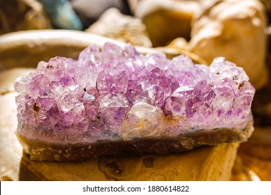 Amethyst Rock On The Table Of A Geology Student.