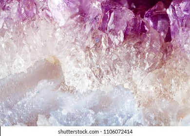 Amethyst. The texture of the mineral. Macro shooting of natural gemstone. The raw mineral. Abstract background.