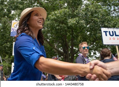 Amherst, N.H./USA - July 4, 2019: U.S. Rep. Tulsi Gabbard Greets A Voter During The Amherst July 4th Parade. 