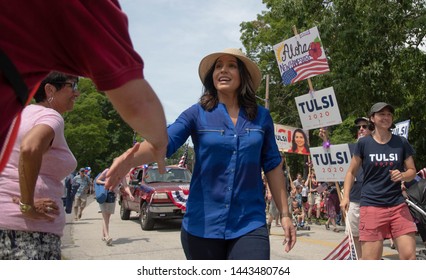 Amherst, N.H./USA - July 4, 2019: U.S. Rep. Tulsi Gabbard Greets A Voter During The Amherst July 4th Parade. 